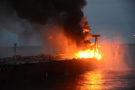 Sri Lanka tows supertanker ablaze off coast, one crewman presumed dead - Reuters